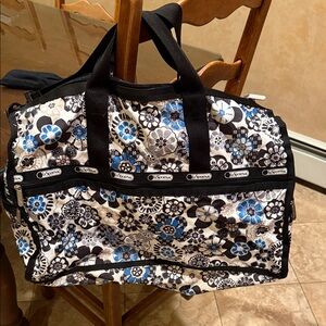 Lesportsac Black, White & Blue Floral Travel Duffel
